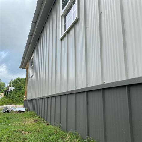 metal tabs outside house wall before masonry|Pros and Cons of Metal Siding .